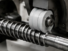 Thread grinding a ball screw
